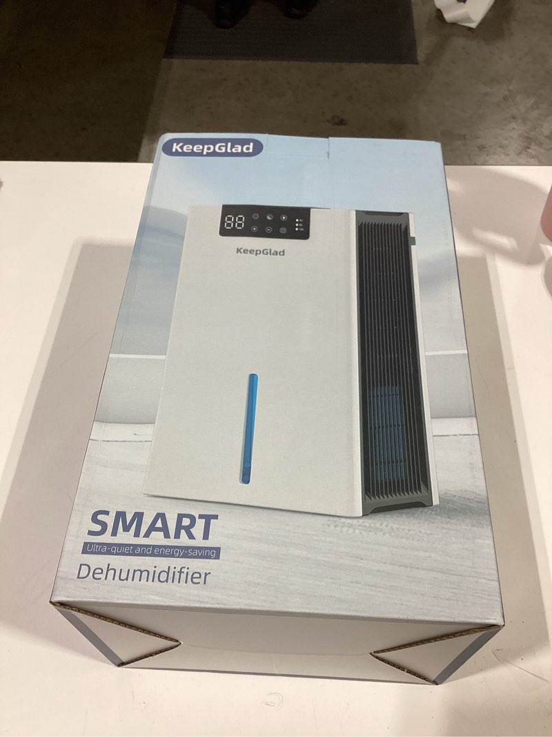 Condition photo showing As Is for keepglad dehumidifier, 98oz dehumidifiers for home(1000sq.ft), humidity display dehumidifier for basement bathroom bedroom, auto shut off, washable filter, drain hose, timer, 7 ambient lights, white