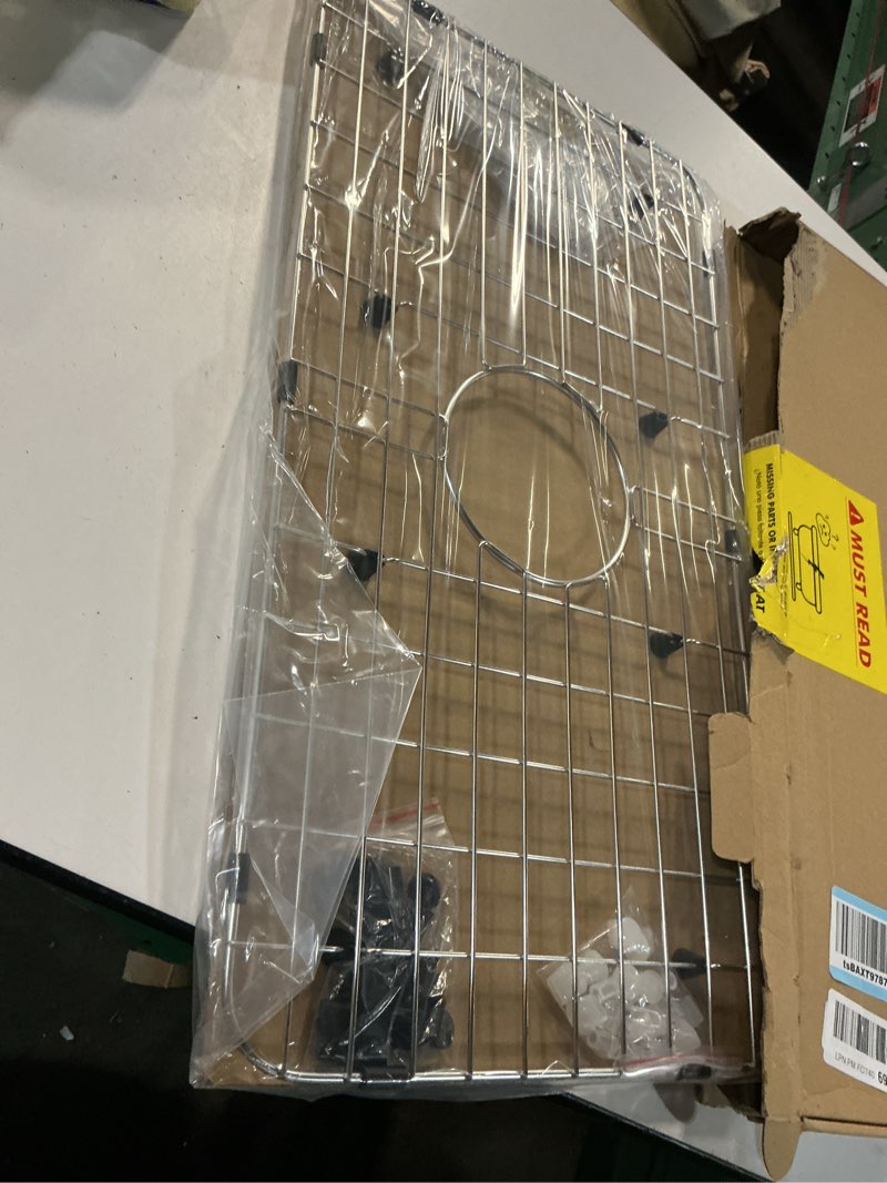 Condition photo showing Good Condition for serene valley sink bottom grid 24-1/8" x 12-5/8", centered drain with corner radius 1-1/2", sink protector nlw2412c