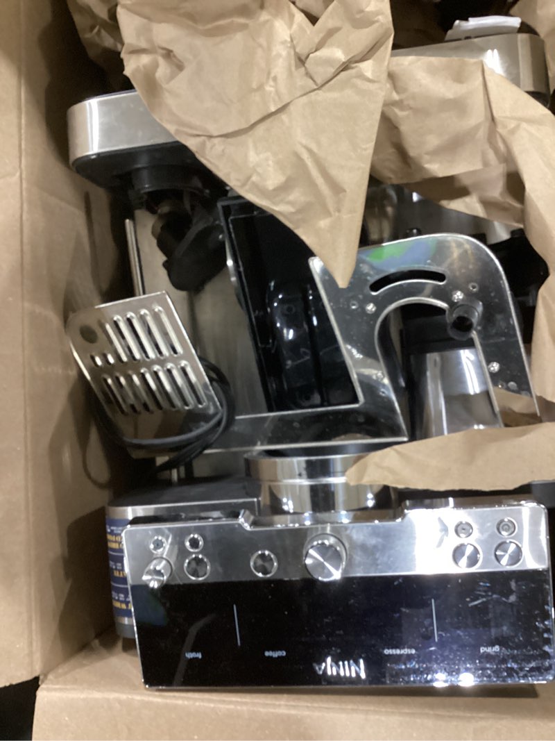 Condition photo showing As Is for ninja luxe café 3-in-1 espresso, drip coffee and cold brew machine | integrated coffee grinder, milk frother, assisted tamper & built-in espresso accessory storage | stainless steel | es601 luxe cafe stainless steel