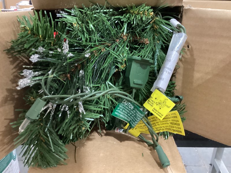 Condition photo showing Good Condition for national tree company 9 ft pre-lit crestwood spruce artificial christmas garland, christmas decoration with glitter, pinecones, red berries, 50 clear lights, 180 tips, green plug in tree