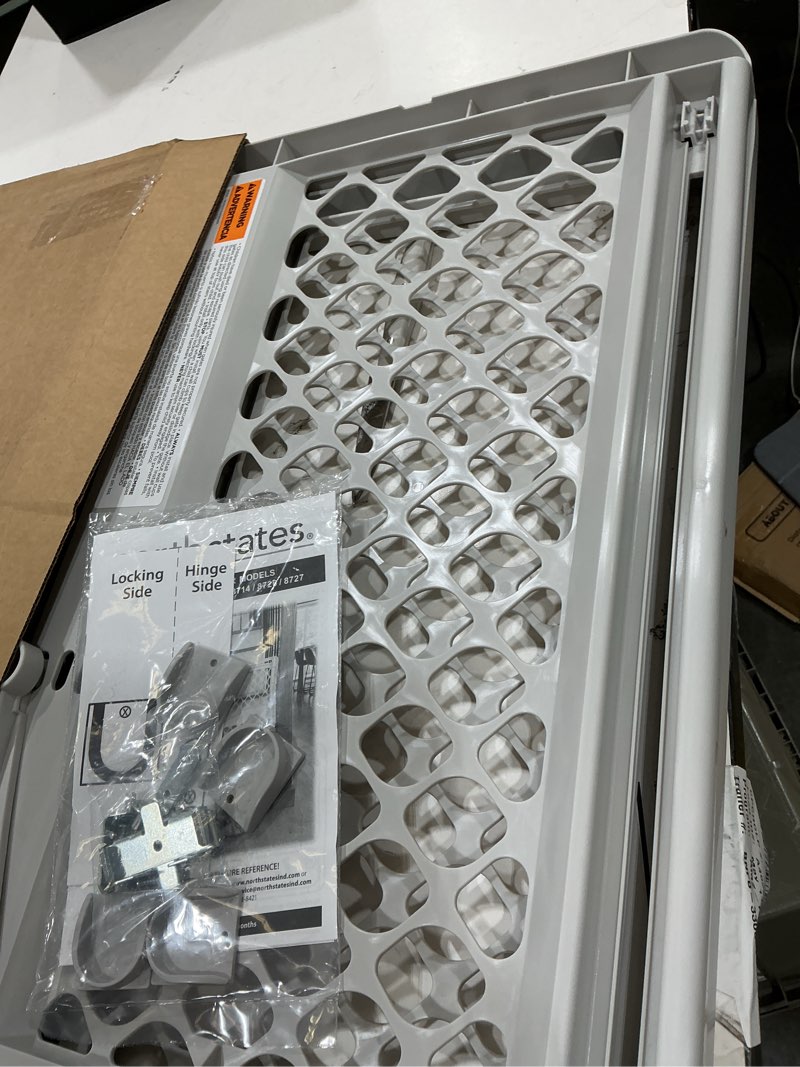 Condition photo showing Good Condition for mypet universal pet gate: 26” - 42” wide dog gate for doorways with pressure fit or swinging door hardware mounting types included: 26" tall; gray