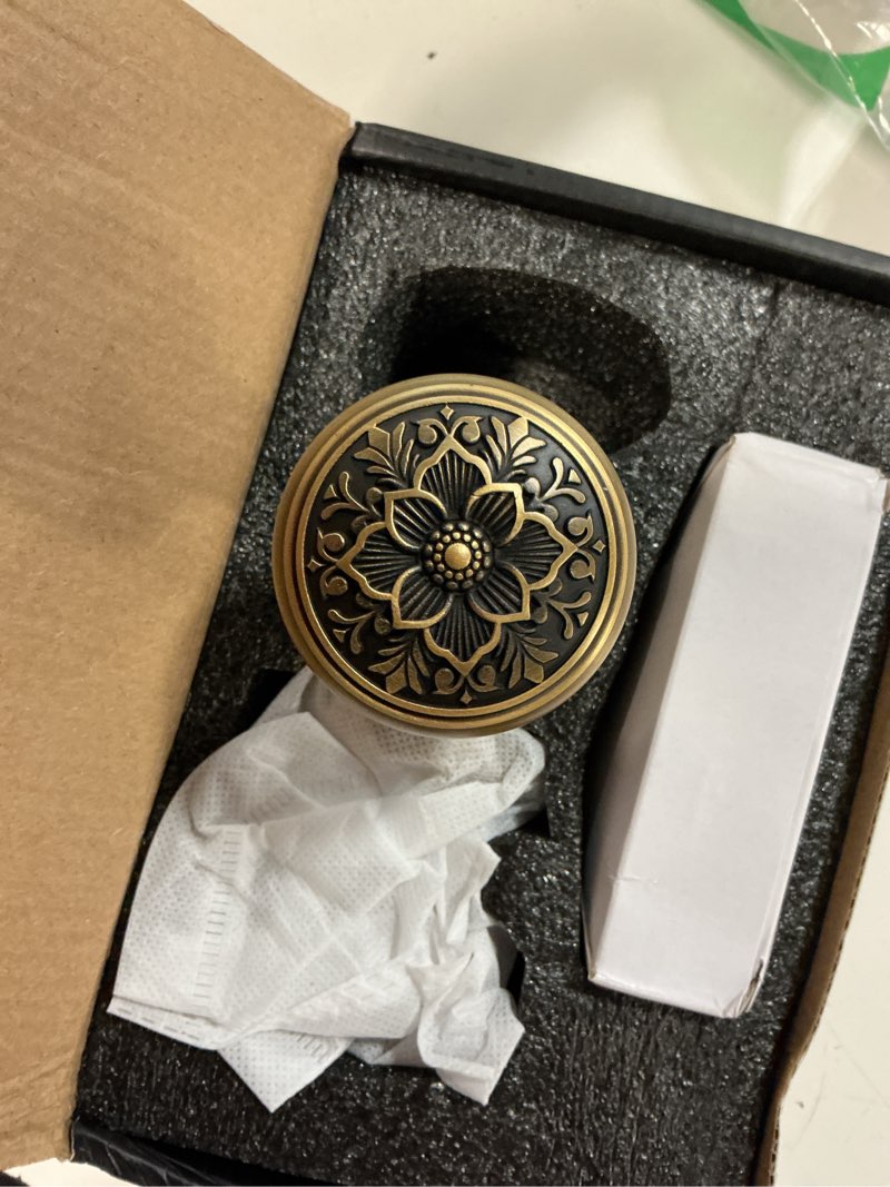 Condition photo showing Good Condition for antique brass door knob with intricate floral design – privacy handles elegant and durable for interior doors, classic vintage look for home or office decor(antique brass, privacy-2.75 in) privacy-2.75 in antique brass