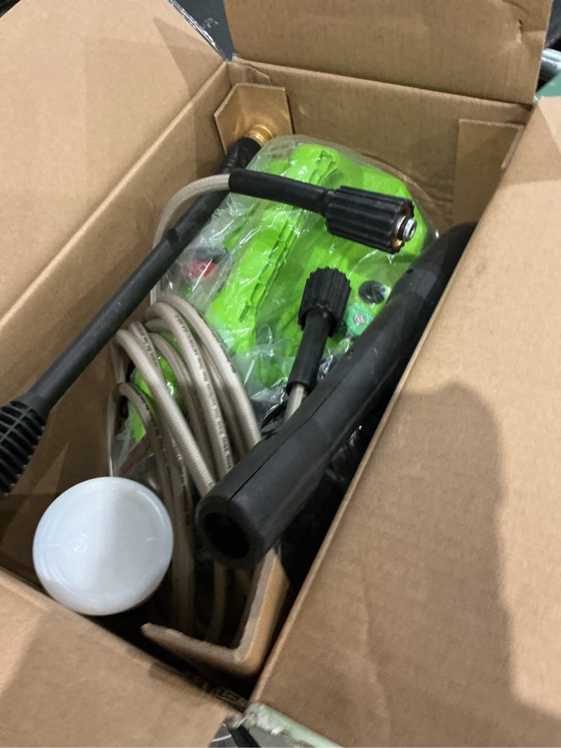 Condition photo showing As Is for greenworks 1800 psi 1.2-gpm cold water electric pressure washer with 2 spray tips