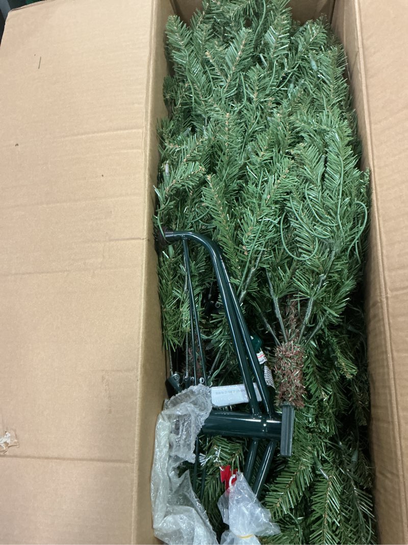 Condition photo showing Good Condition for Puleo International 6.5 Foot Pre-Lit Slim Fraser Fir Artificial Christmas Tree with 350 UL Listed Clear Lights, Green 6.5' Slim Fraser Fir with 350 Clear Lights