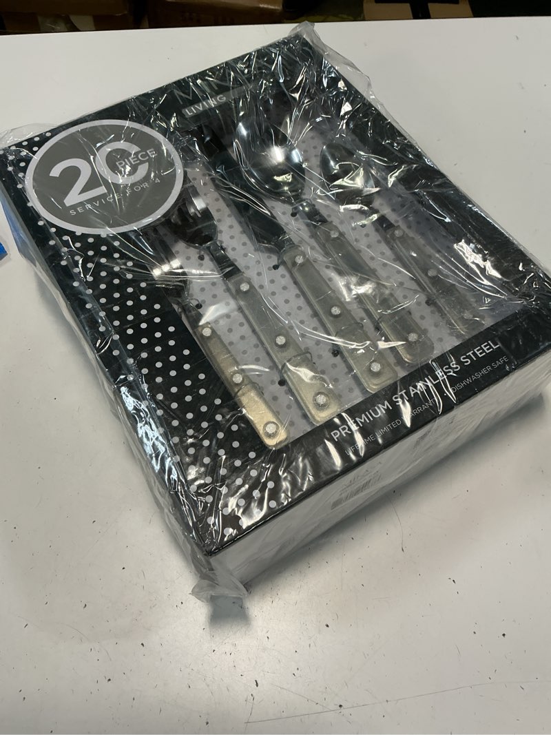 Condition photo showing New/Like New for mikasa living clear translucent 18/0 stainless steel 20-piece flatware set, service for 4, clear