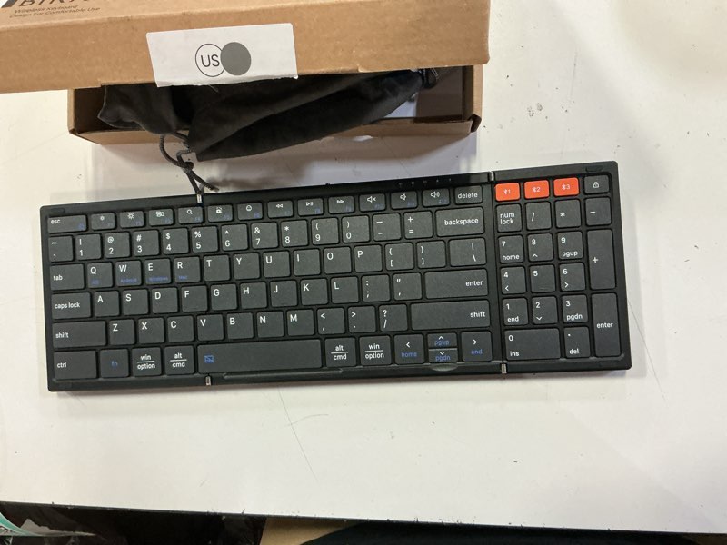 Condition photo showing Good Condition for meetion new foldable bluetooth keyboard with touchpad, portable wireless keyboard with numeric keypad, full-size rechargeable business travel for ipad phone laptop pc ios, 2026 new upgrade black