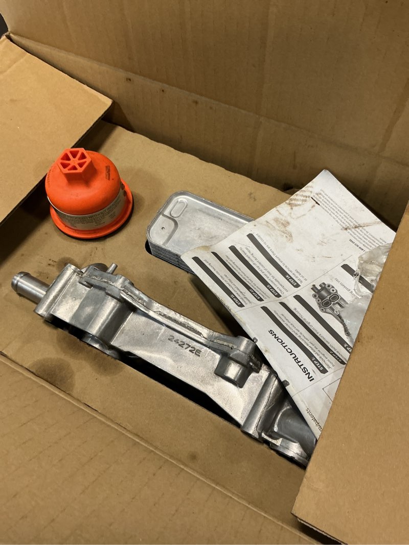 Condition photo showing As Is for Dorman 926-959 Patented Upgraded Aluminum Engine Oil Filter Housing with Oil Cooler and Filter Compatible with Select Models (OE FIX)