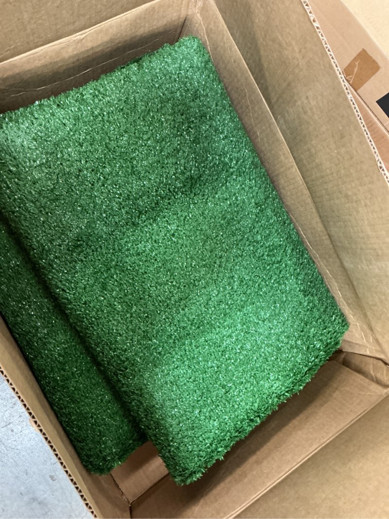 Condition photo showing As Is for Garland Rug Artificial Grass 7 Ft. X 10 Ft. Large Indoor/Outdoor Area Rug Green -Lush Green, Durable, and Low-Maintenance for Patios, Lawns, and More Green 7' x 10' (Rectangular)