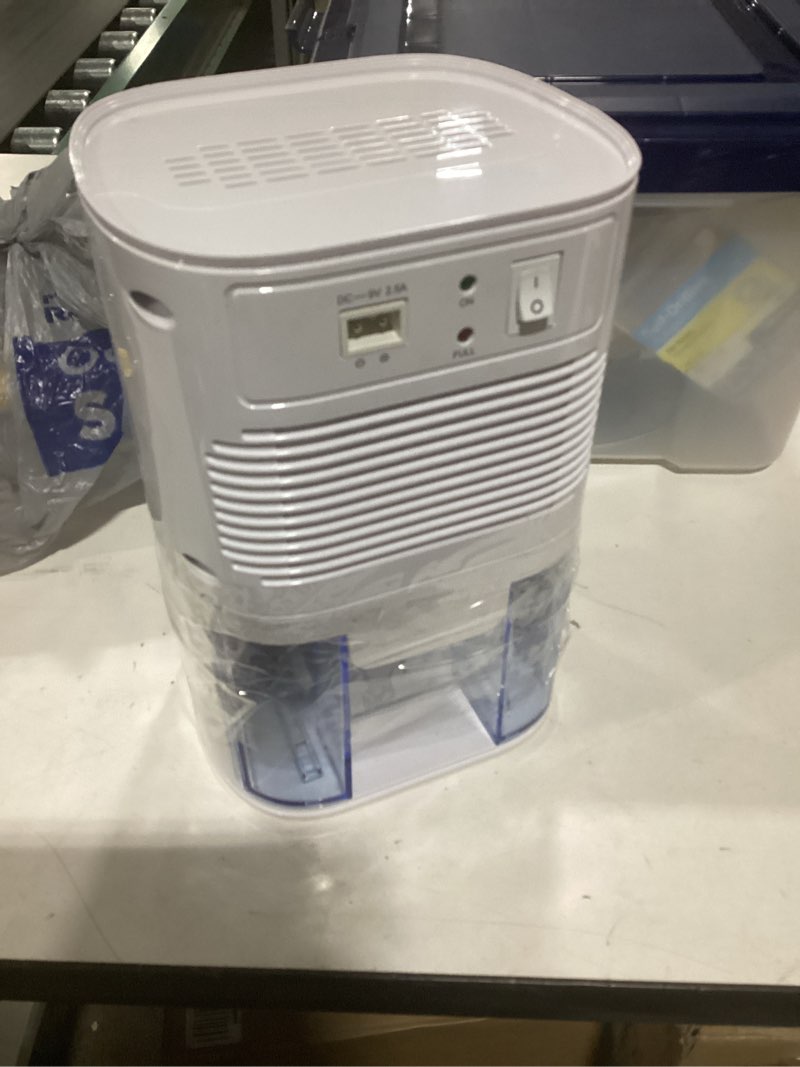 Condition photo showing Good Condition for Pure Enrichment PureDry Mini Dehumidifier 0.53 -Pint Small Room Dehumidifier White