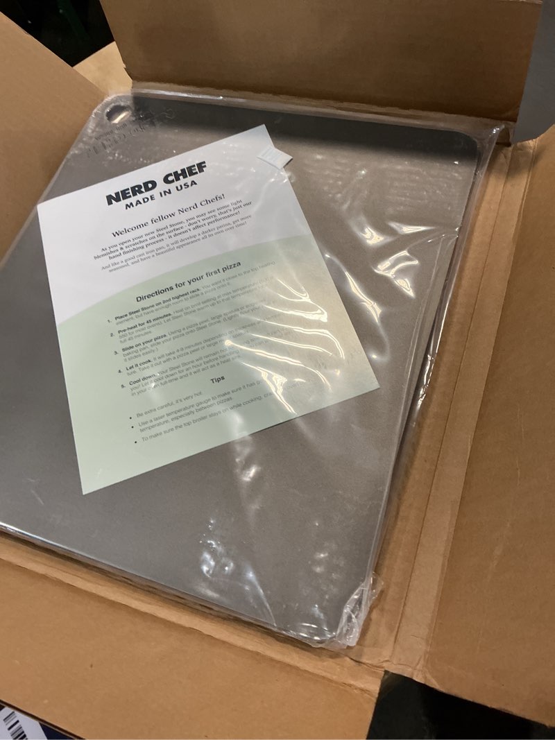 Condition photo showing New/Like New for NerdChef Steel Stone - High Performance Pizza Baking | Made in USA (14.5" x 16" x 1/4") - (.25" Thick - Standard)