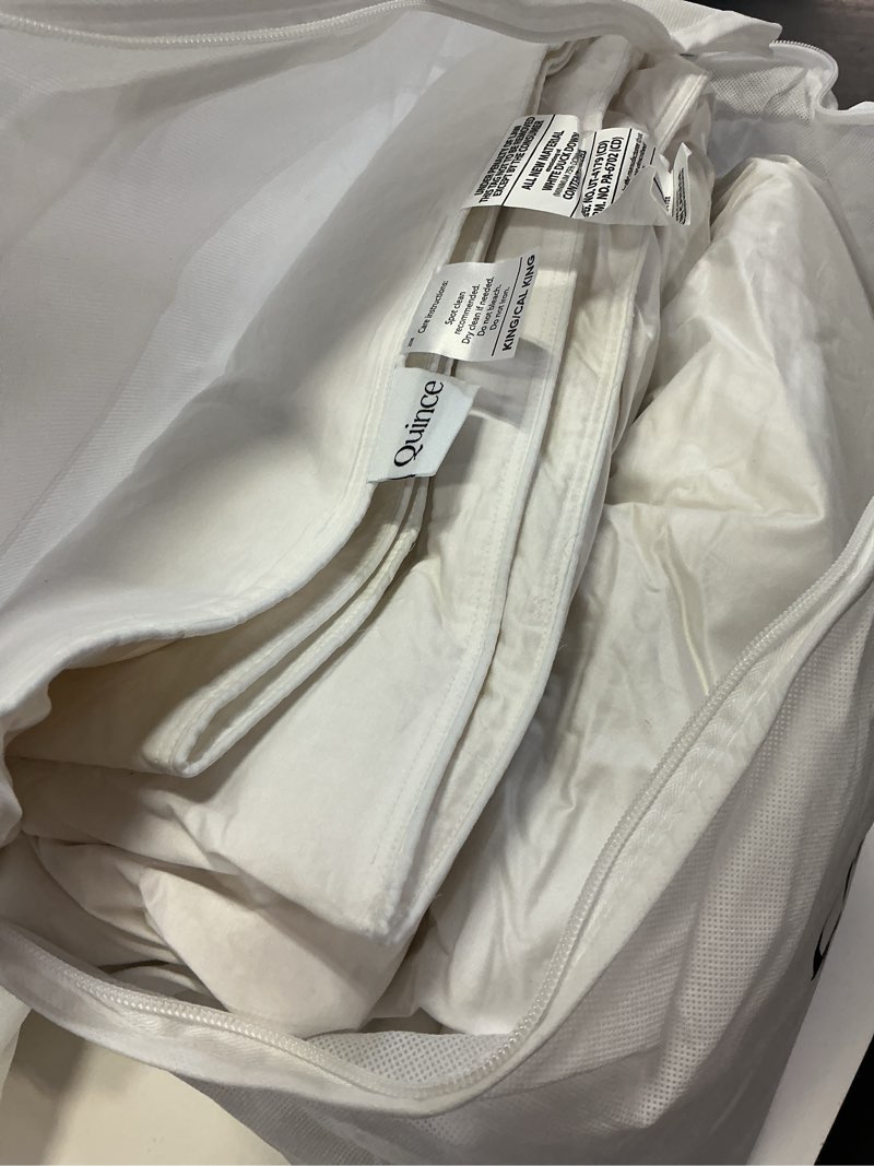 Condition photo showing As Is for premium down comforter white king