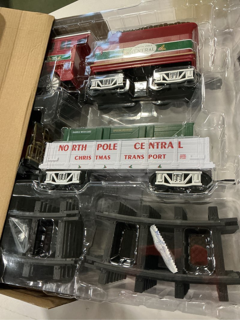 Condition photo showing Good Condition for Lionel Battery-Operated North Pole Central Freight Toy Train Set with Bluetooth, Locomotive, Train Cars, & Track with Authentic Train Sounds, Lights, & Water Vapor Smoke Effects for Kids 4+