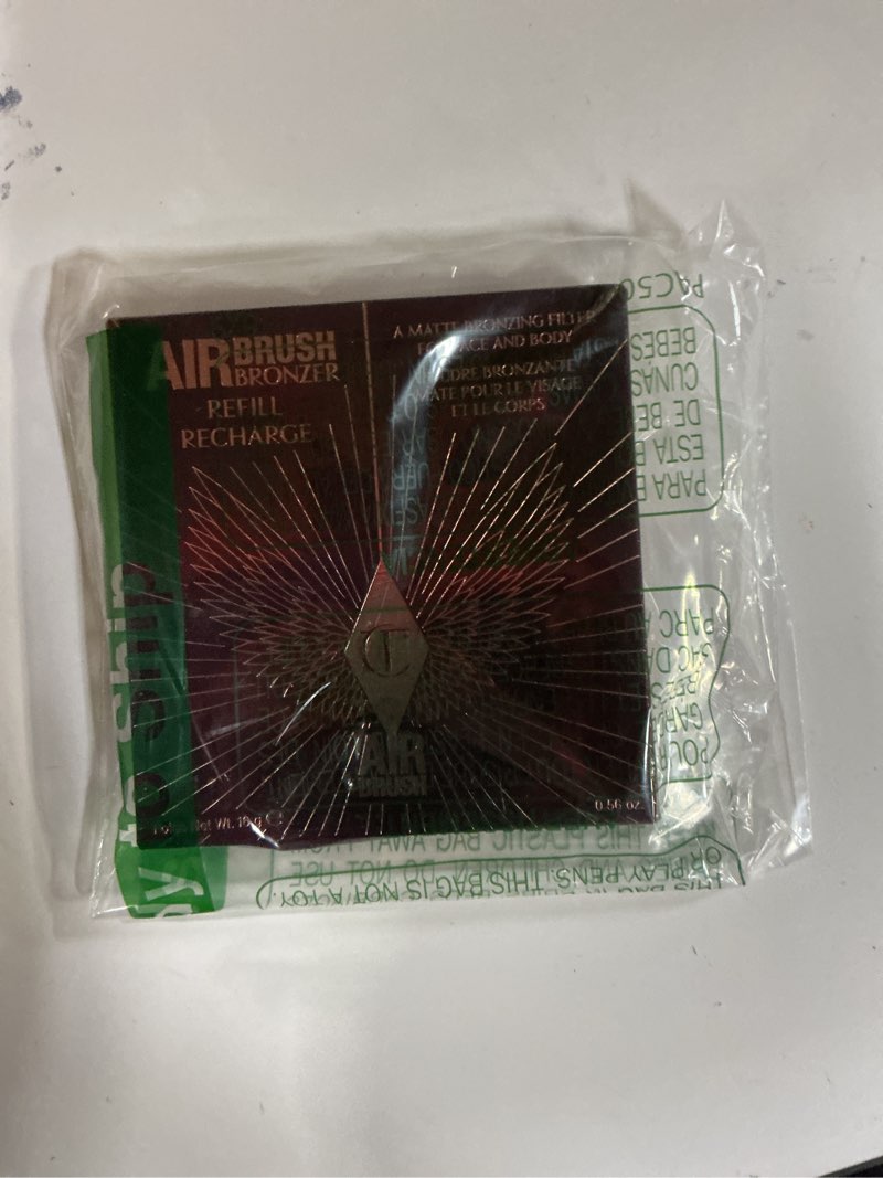 Condition photo showing New/Like New for Charlotte Tilbury Airbrush Matte Bronzer Refill - Smoothing & Blurring Powder Bronzer with an Airbru