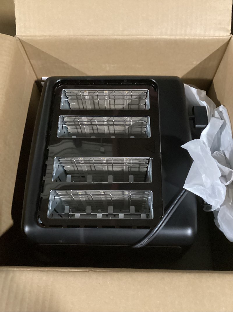 Condition photo showing Good Condition for Amazon Basics 4 Slice Toaster, With 7 Browning Settings, Extra Wide Slots For Bagels and Special Breads, Removable Easy-to-Clean Crumb Trays, Cancel/Defrost/Bagel Buttons, 1500W, Black & Silver 4 Slice Matte Black Front