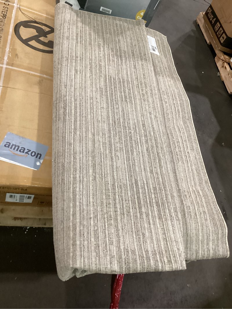 Condition photo showing As Is for loloi darby collection dar-07 pebble/sand 9'-2" x 13' area rug pebble / sand 9'2" x 13' (rectangular)