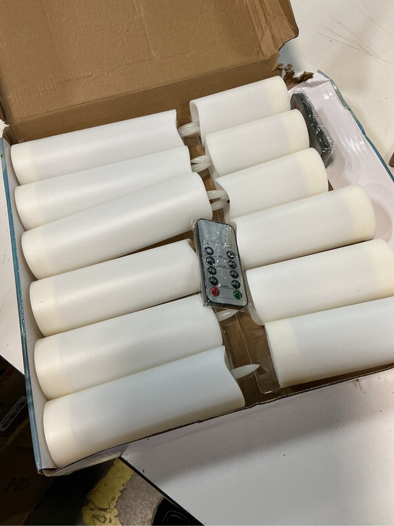 Condition photo showing Good Condition for 12 pcs battery operated waterproof white plastic flameless pillar candles with timer & 2 remotes, 2.2" x4" 4" 4" 5" 5" 5" 6" 6" 6" 7" 7" 7" outdoor flickering led warm light for home decor