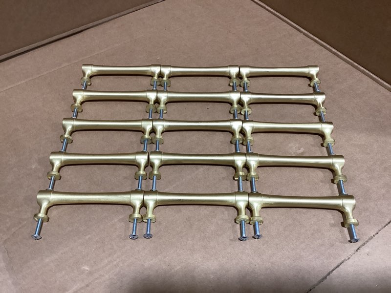 Condition photo showing As Is for Origin 21 Siri 3-3/4-in , 96mm Center to Center Brushed Brass Cylindrical Bar Drawer Pull 15-Pack
