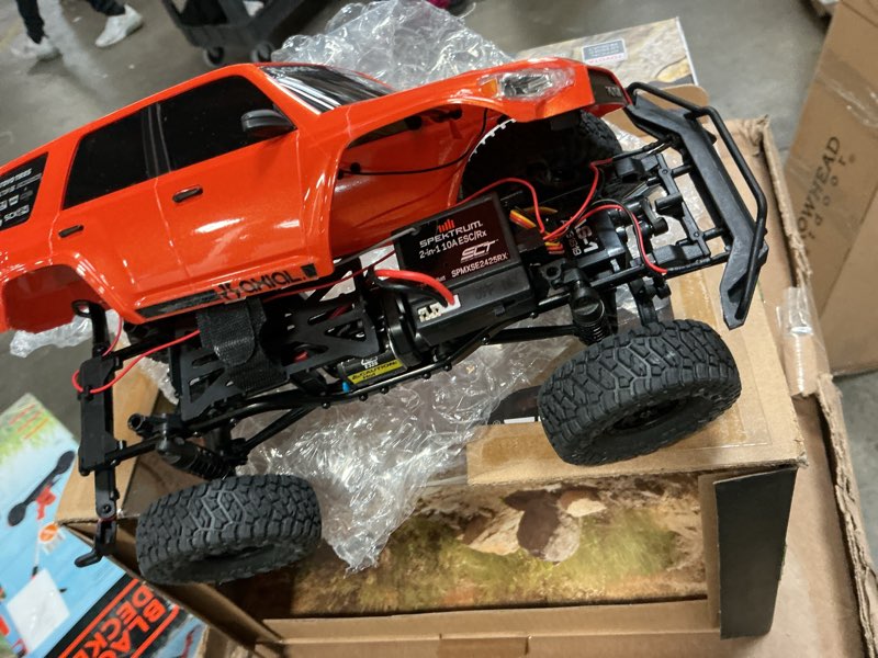 Condition photo showing As Is for Axial RC Truck 1/24 SCX24 Toyota 4Runner 4X4 RTR Brushed Rock Crawler, RTR (Battery and Charger Incl