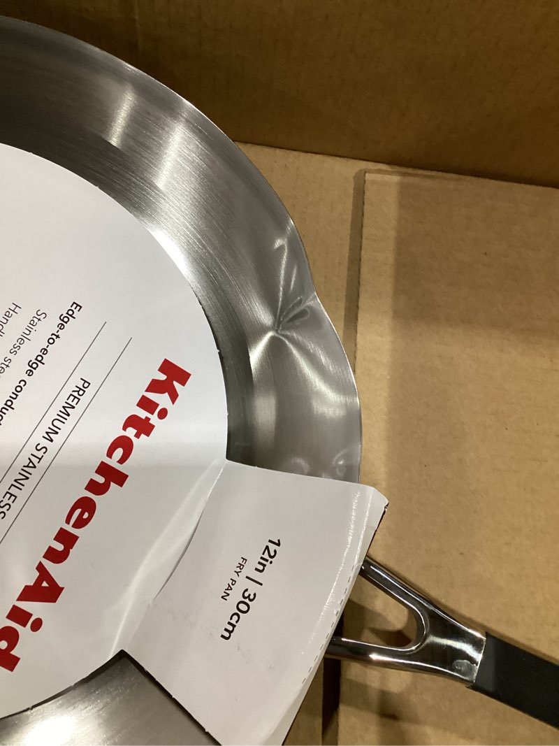Condition photo showing As Is for KitchenAid 71025 Stainless Steel Frying Pan/Skillet, 12 Inch - Brushed Stainless Steel, SLIGHTLY BENT