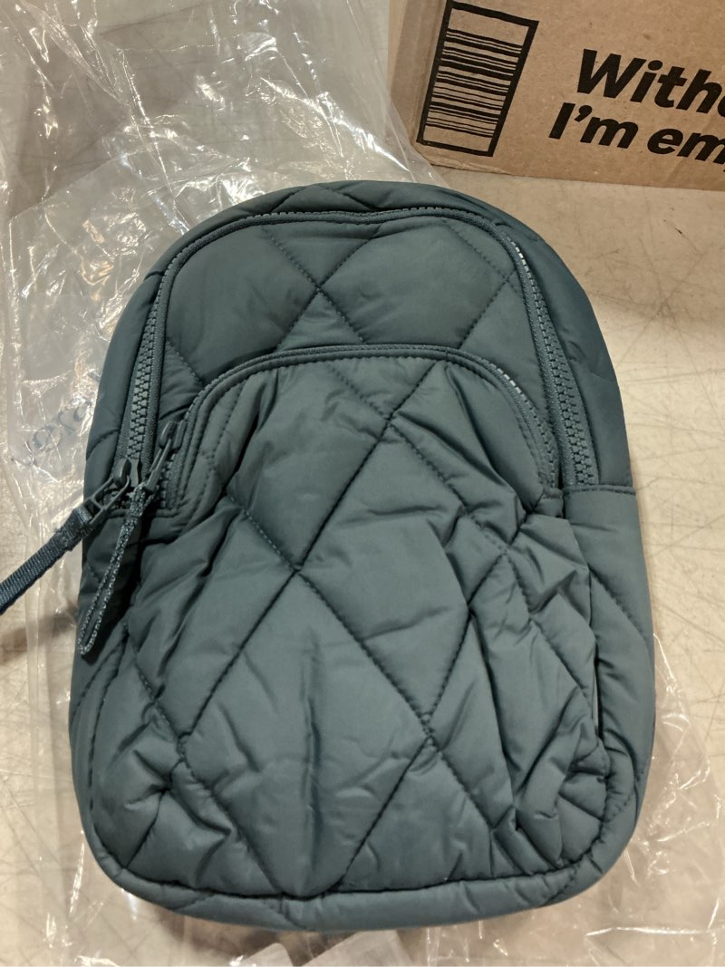 Condition photo showing New/Like New for vera bradley women's featherweight lorman sling backpack – water resistant crossbody purse for travel & work – dark slate one size dark slate