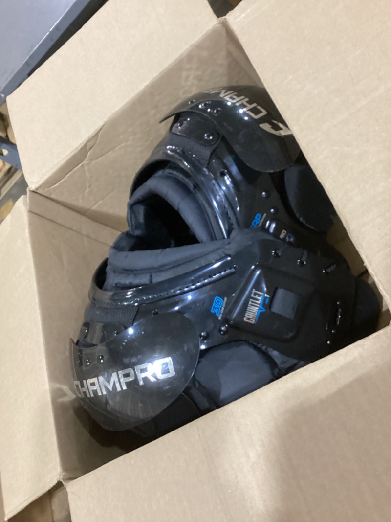Condition photo showing Good Condition for champro gauntlet i youth shoulder pads black, blue large