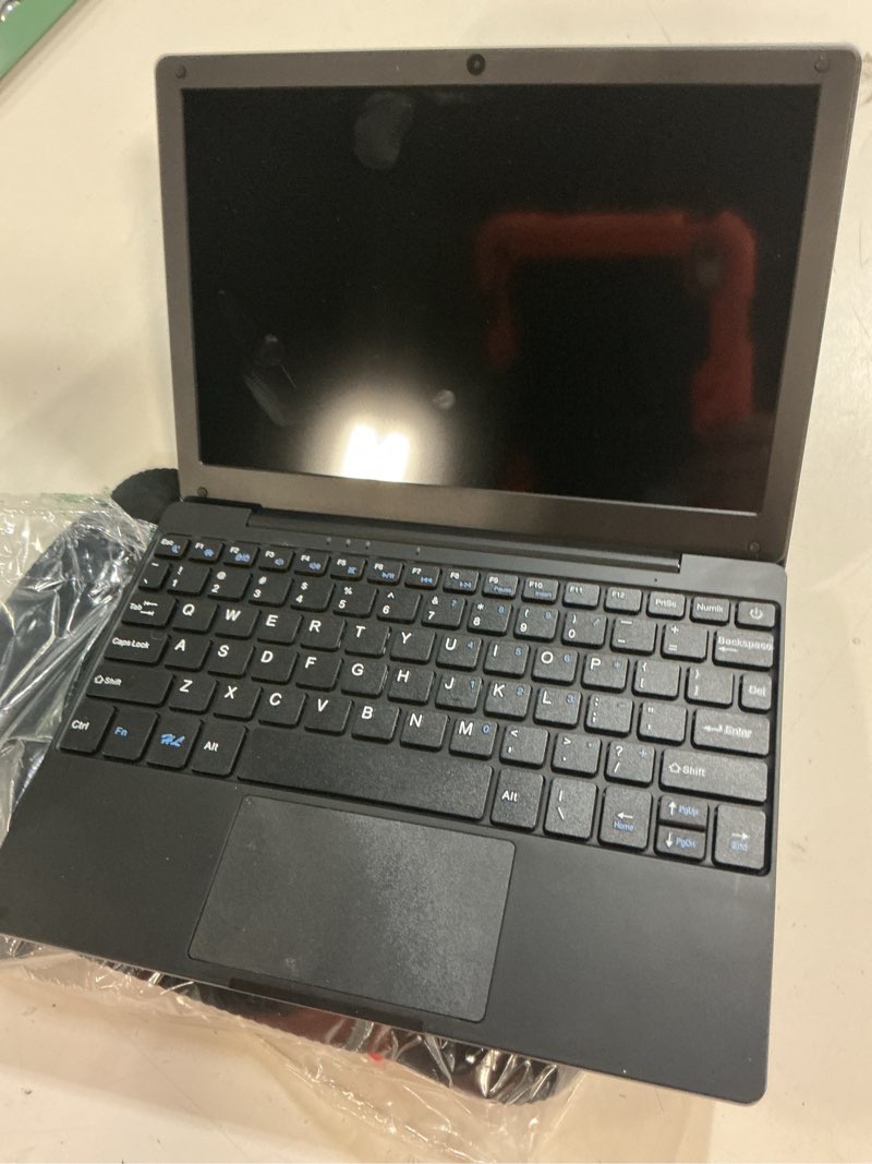 Condition photo showing As Is for mini laptop computer, 10.1 inch android 13, 2gb ram, 64gb storage, hd ips display, 1280x800 pixel, portable netbook with allwinner a133 cpu (black)
