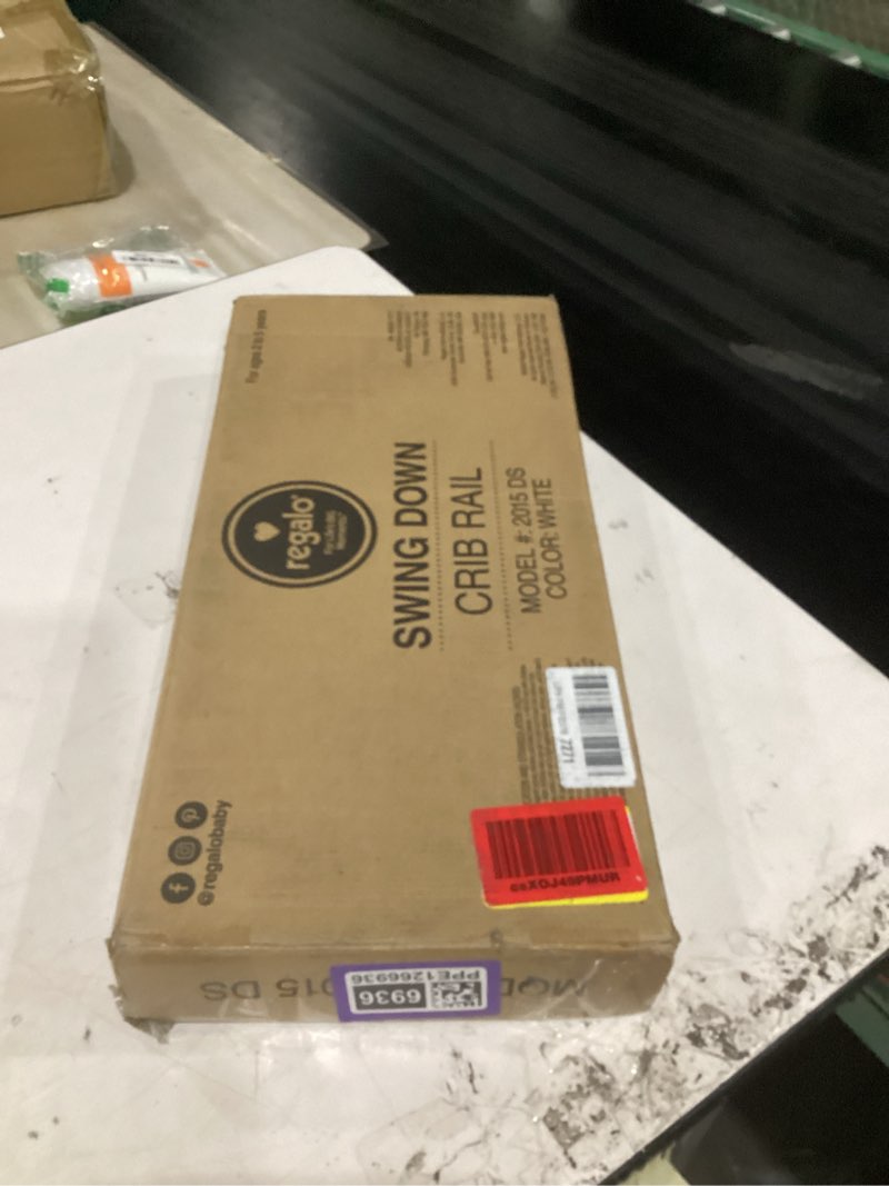 Condition photo showing New/Like New for regalo convertible swing down crib rail