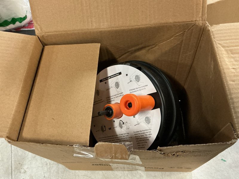 Condition photo showing As Is for drain auger, clog remover with drill adapter, 25 feet flexible plumbing snake use manually or powered for kitchen, bathroom and shower sink, comes with gloves (orange)