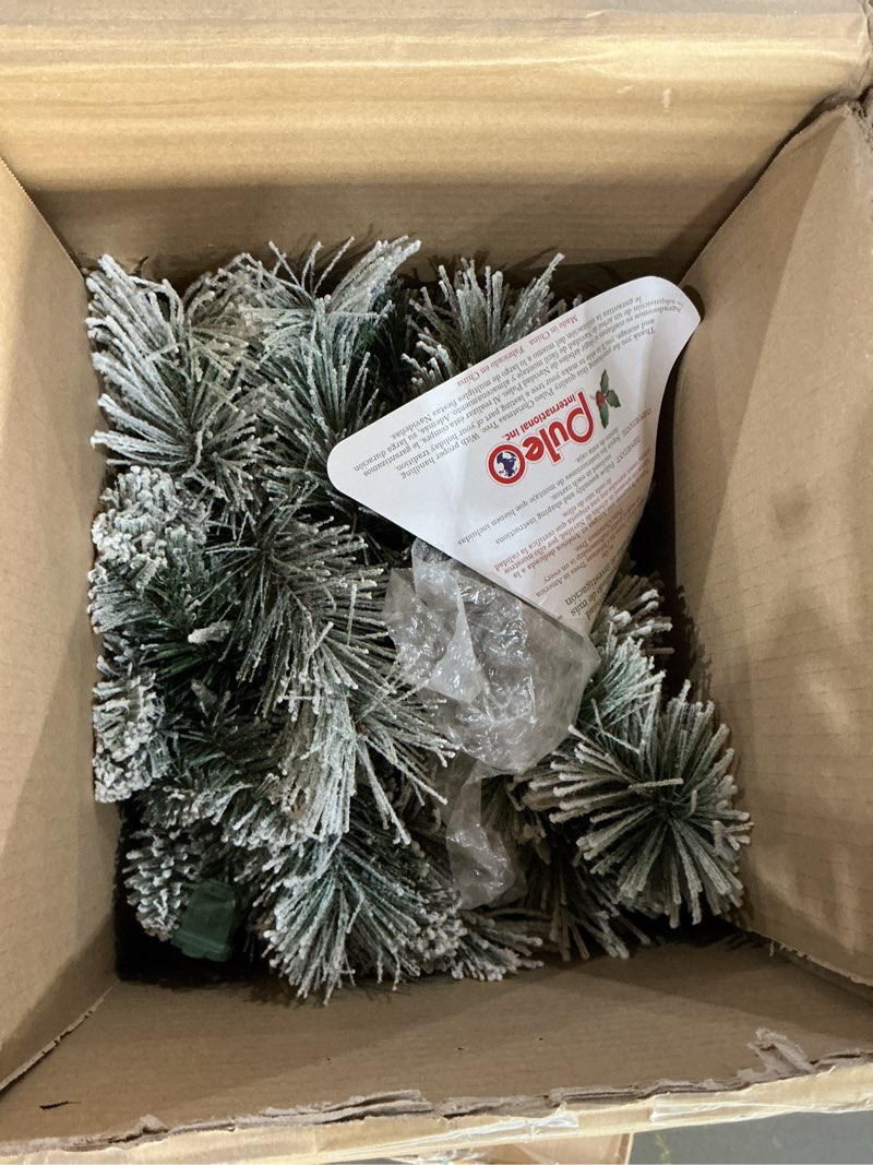 Condition photo showing As Is for Puleo International 7.5ft Pre-Lit Flocked Portland Pine Pencil Christmas Tree with 350 Clear Lights, 496 Realistic Dense Snow Flocked Branch Tips, Easy Setup Artificial Trees with Sturdy Metal Stand 7.5' Flocked Portland Pine 350 Clear Lights