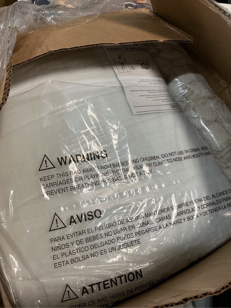 Condition photo showing New/Like New for Delta Children Checkered Cozee Chair, Cream