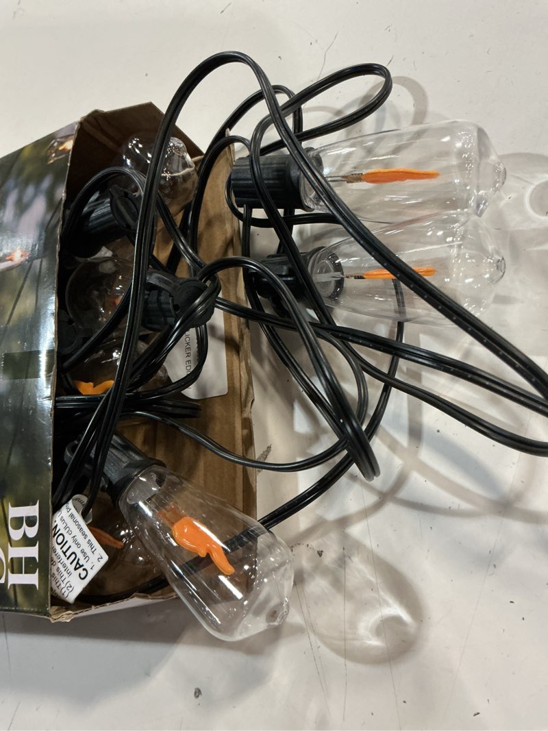 Condition photo showing As Is for better homes & gardens 10-count flickering flame led outdoor edison string lights