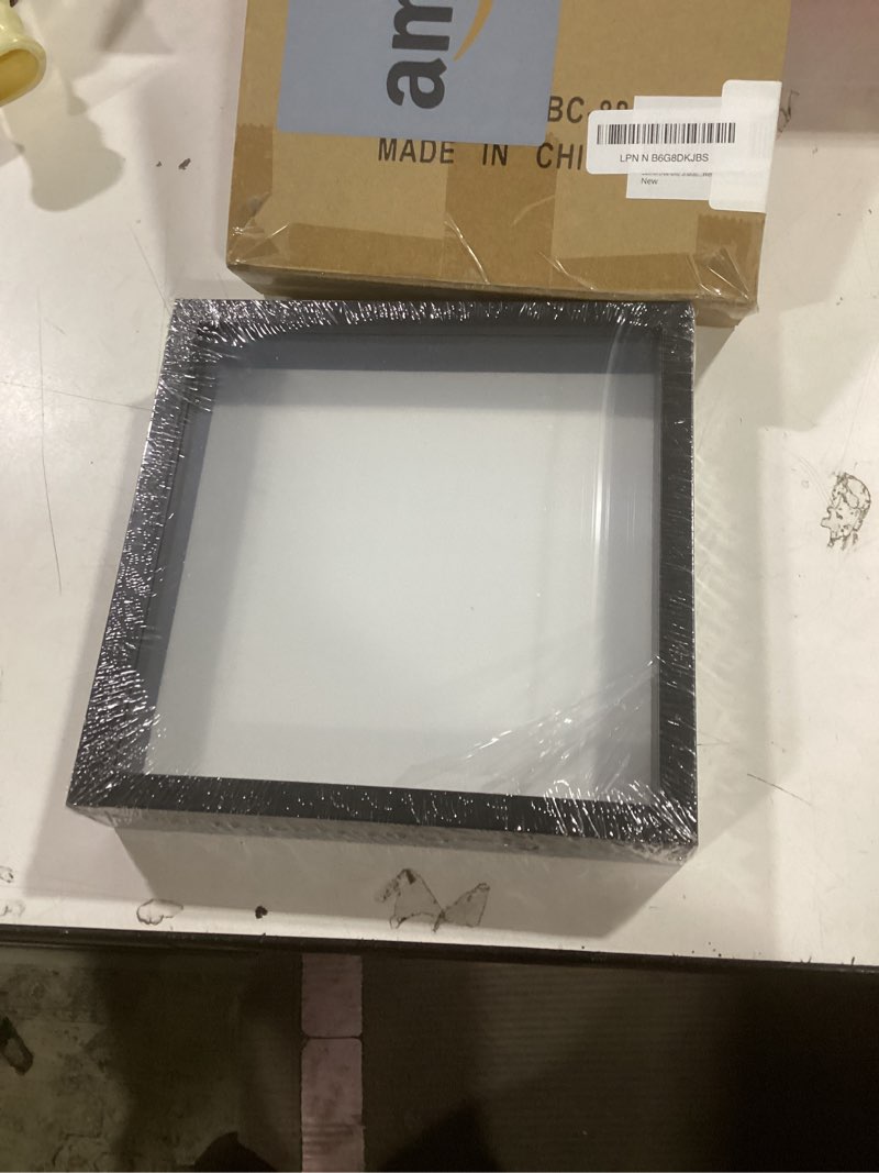 Condition photo showing New/Like New for Muzilife 8x8 Shadow Box Picture Frame with Linen Board - Deep Wood & Glass Display Case Ready to Hang Memory Box Baby Sports Memorabilia, Pins, Awards, Medals, Wedding, Tickets and Photos (Black) Black 8x8