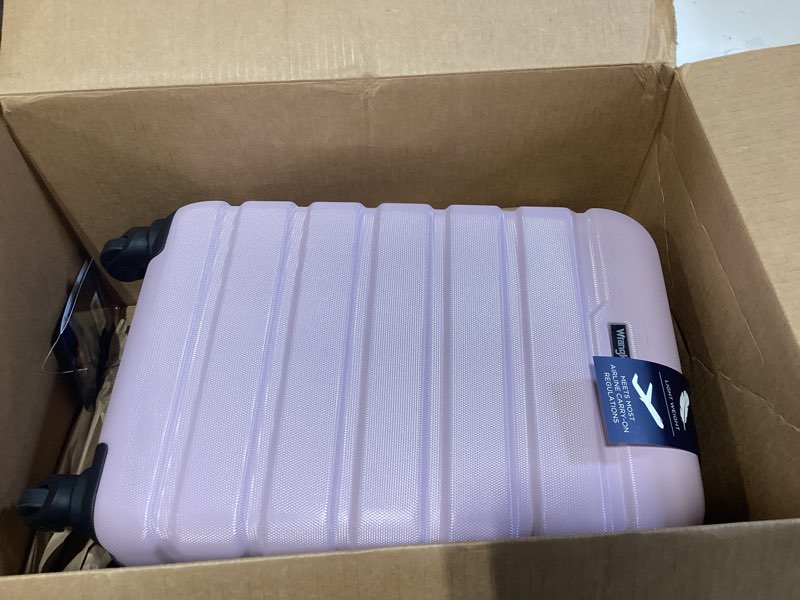 Condition photo showing New/Like New for Wrangler 22" Hardside Spinner Carry-On Luggage, Lilac