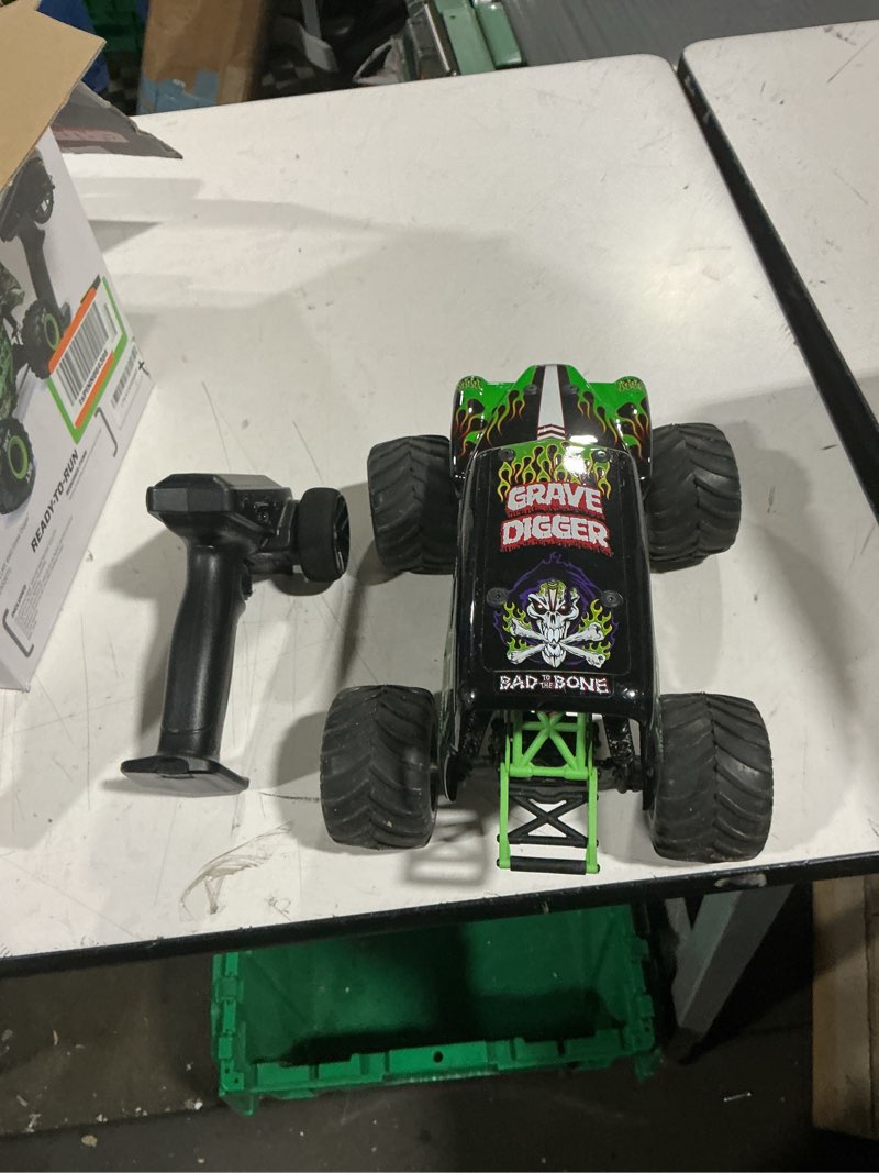 Condition photo showing As Is for losi 1/18 mini lmt grave digger 2s 4x4 rtr brushed monster truck battery & charger included green los01026t1