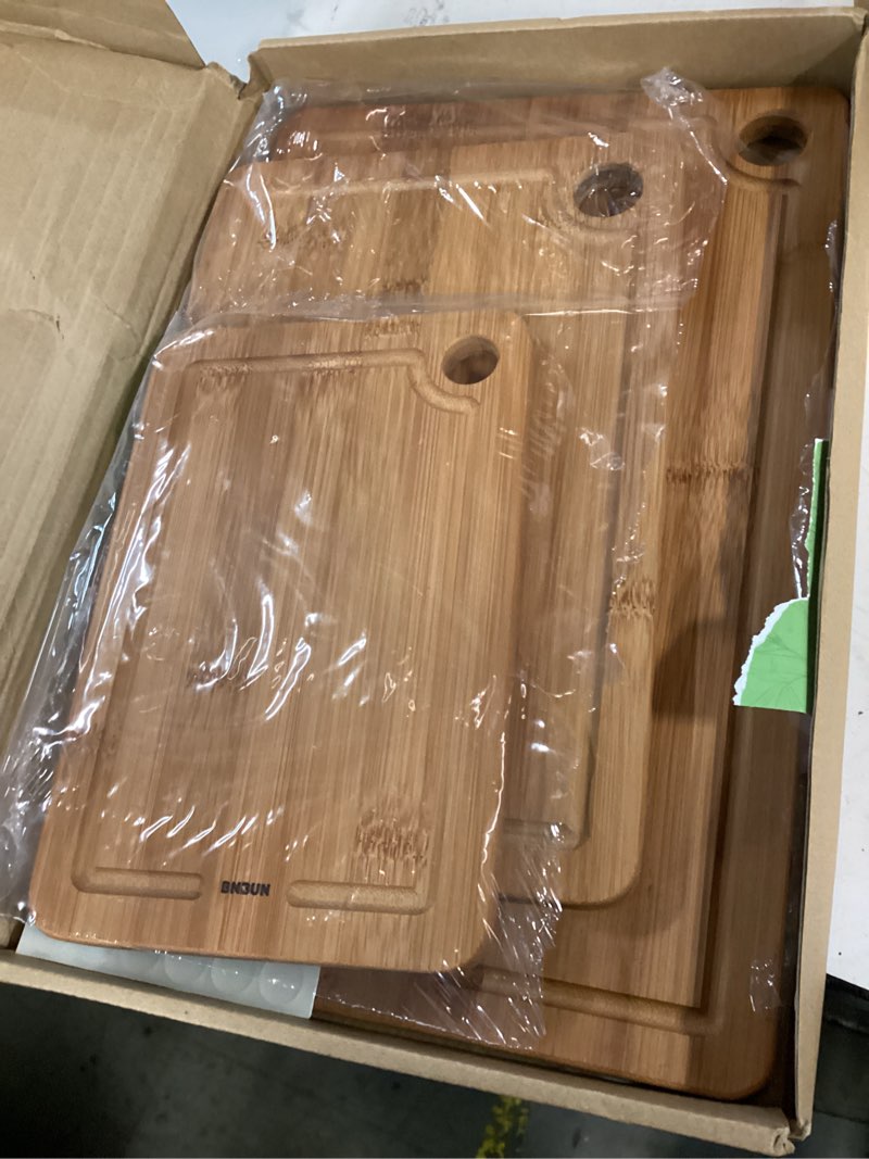 Condition photo showing Good Condition for bamboo cutting board for kitchen – 3-piece wooden boards with juice grooves, side handles, non-slip mats – perfect for meat, veggies fruit,bread boards – ideal kitchen gift carbonized brown set of 3(s+m+xl?