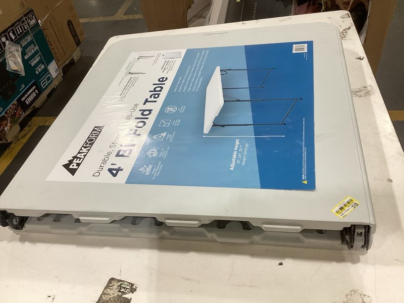 Condition photo showing As Is for peakform 4-foot, height adjustable, fold in half table, gray