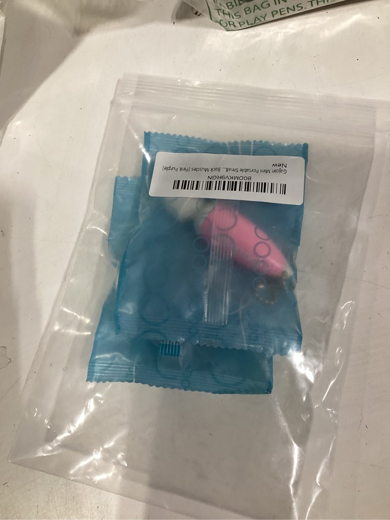 Condition photo showing New/Like New for mini portable small keychain massage tool heads massager pocket toy for neck shoulder face back muscles (pink purple)