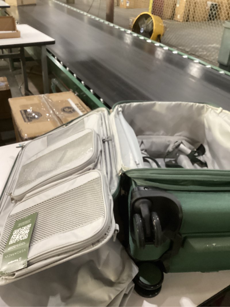Condition photo showing Good Condition for Travelpro VersaPack+ Lightweight Softside Expandable Carry on Luggage, 8 Spinner Suitcase, TSA Lock, Men and Women, Compact Carry On 20-Inch, Desert Sage Green Compact Carry On Desert Sage Green