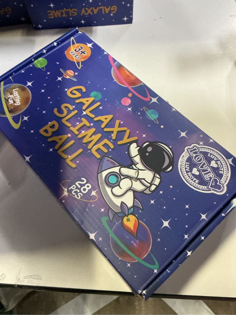 Condition photo showing New/Like New for 28 Pack Valentines Day Gifts for Kids, Valentines Galaxy Slime with Valentines Day Cards Space Gift Boxes, Valentine Classroom Favors Valentines Cards for Boys Girls Class Exchange Prizes Valentines Galaxy Slime A
