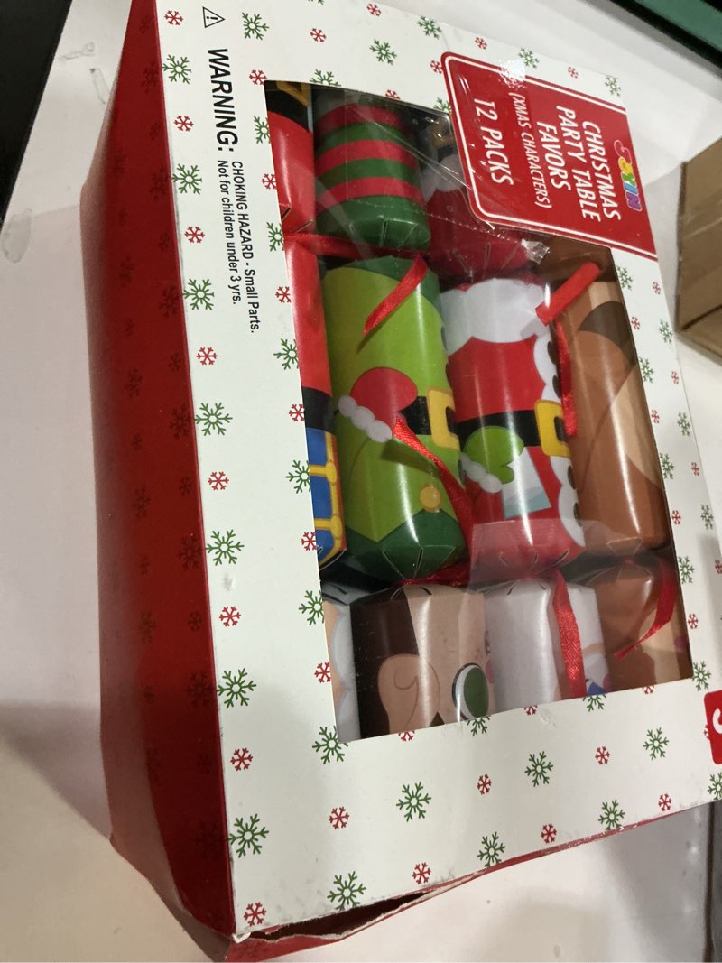 Condition photo showing Good Condition for JOYIN 12 Pack Christmas No-Snap Party Favor, Xmas Table Favor Includes Party Hat, Jokes & Gifts, Christmas Table Decorations for Holiday Dinner Traditions Party Supplies, Stocking Stuffers for Kids