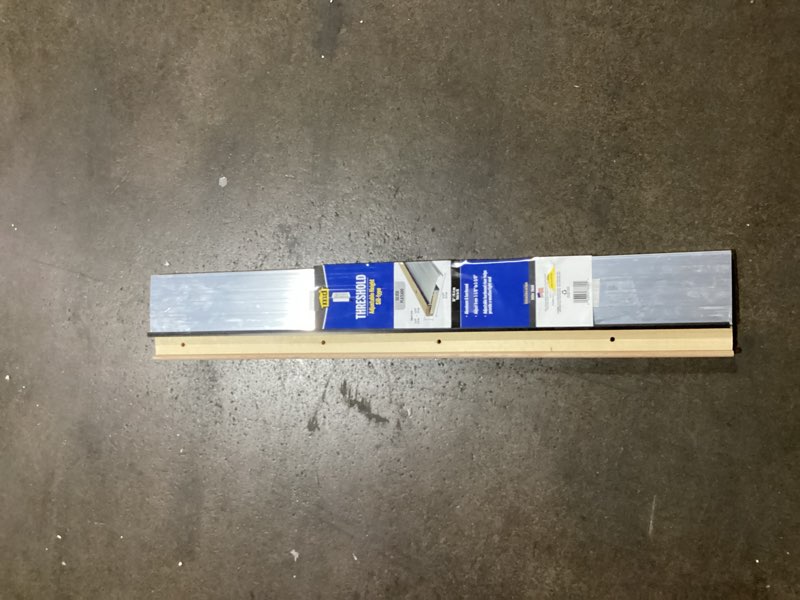 Condition photo showing Good Condition for m-d 36-in x 5.625-in aluminum/wood door threshold (install with screws)