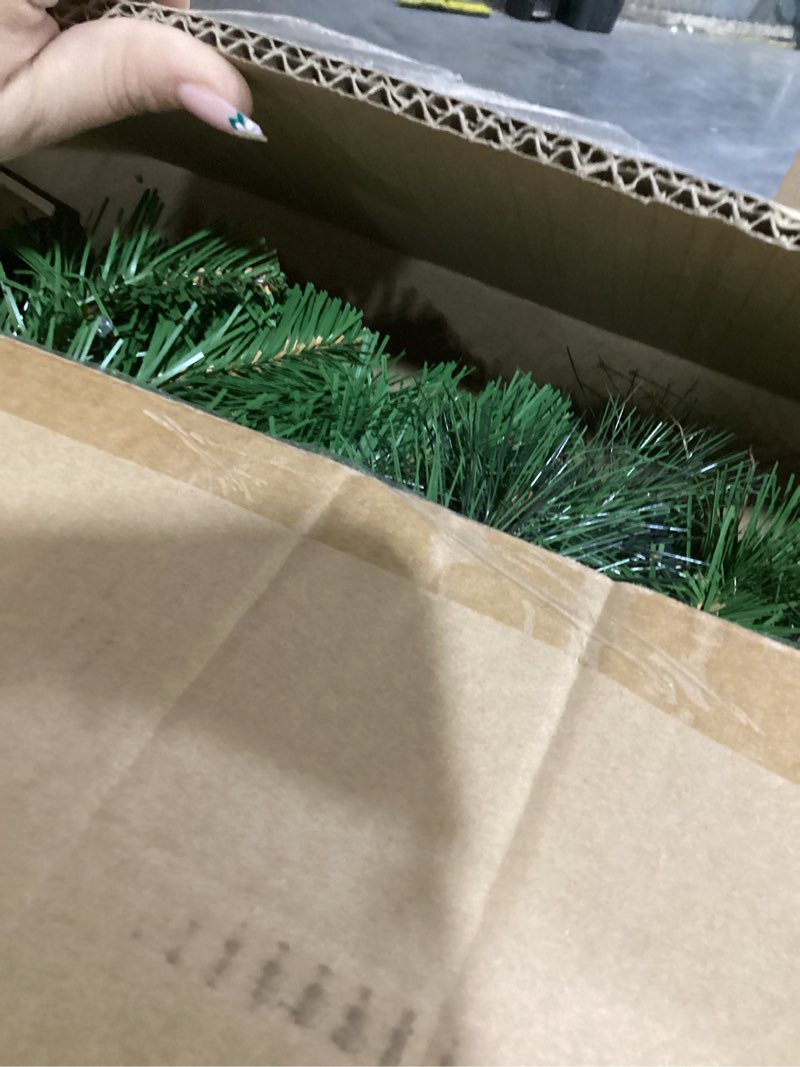 Condition photo showing As Is for Brightown 48-inch Large Christmas Wreath with Timer and Memory Function, Featuring 200 Warm White LED Lights, PVC Pine Needles, Leaves, Red Berries and Cones, for Doors, Walls and Mantels, Plug-in Green 48inch