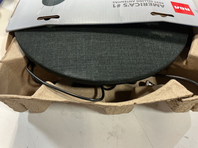 Condition photo showing As Is for rca amplified indoor fabric multi-directional hdtv antenna with built-in stand and 60-mile range
