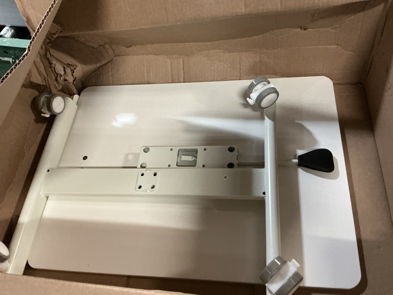 Condition photo showing As Is for 18.9 * 25.6 inch Mobile Standing Desk,T Shaped Pneumatic Adjustable Height Stand Up Desk,with Lockable Wheels,Ergonomic Standing Side Table for Home Office Work Computer Workstation White