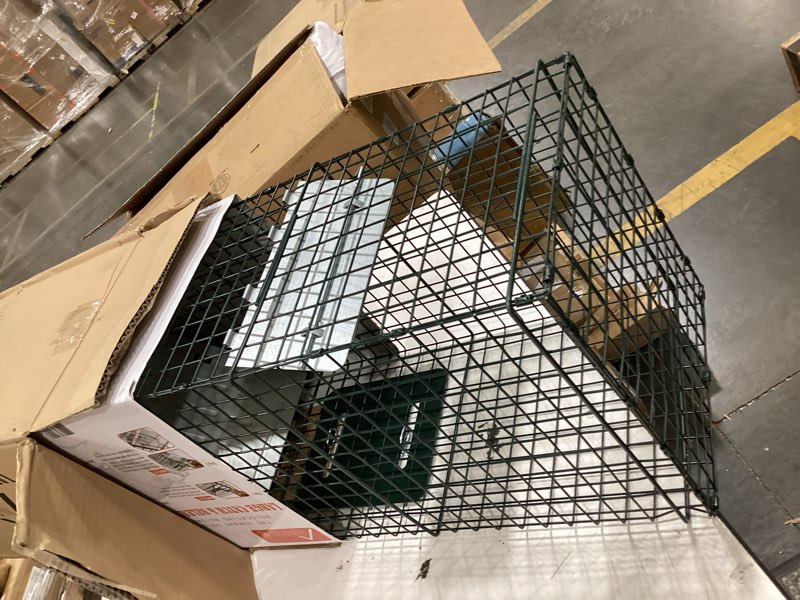 Condition photo showing New/Like New for homestead 32 inch live animal trap - specialized for raccoons, opossums, groundhogs, skunks, feral cats, squirrels - humane way catch & release animal trap