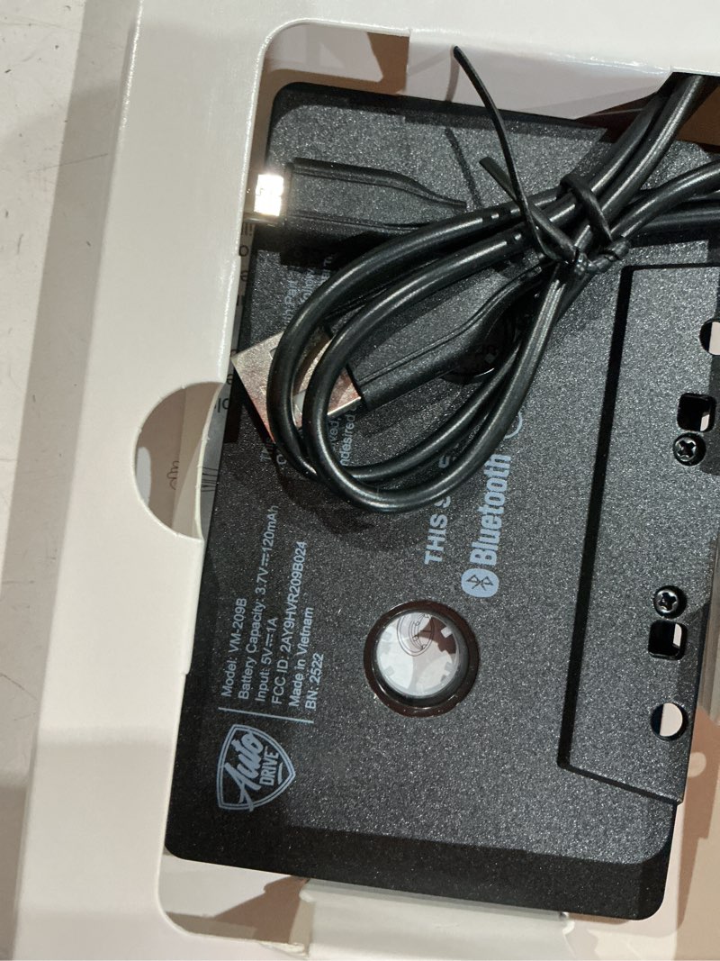 Condition photo showing As Is for auto drive bluetooth cassette adapter two-channel cassette head  1.66oz with 60mm charging cable