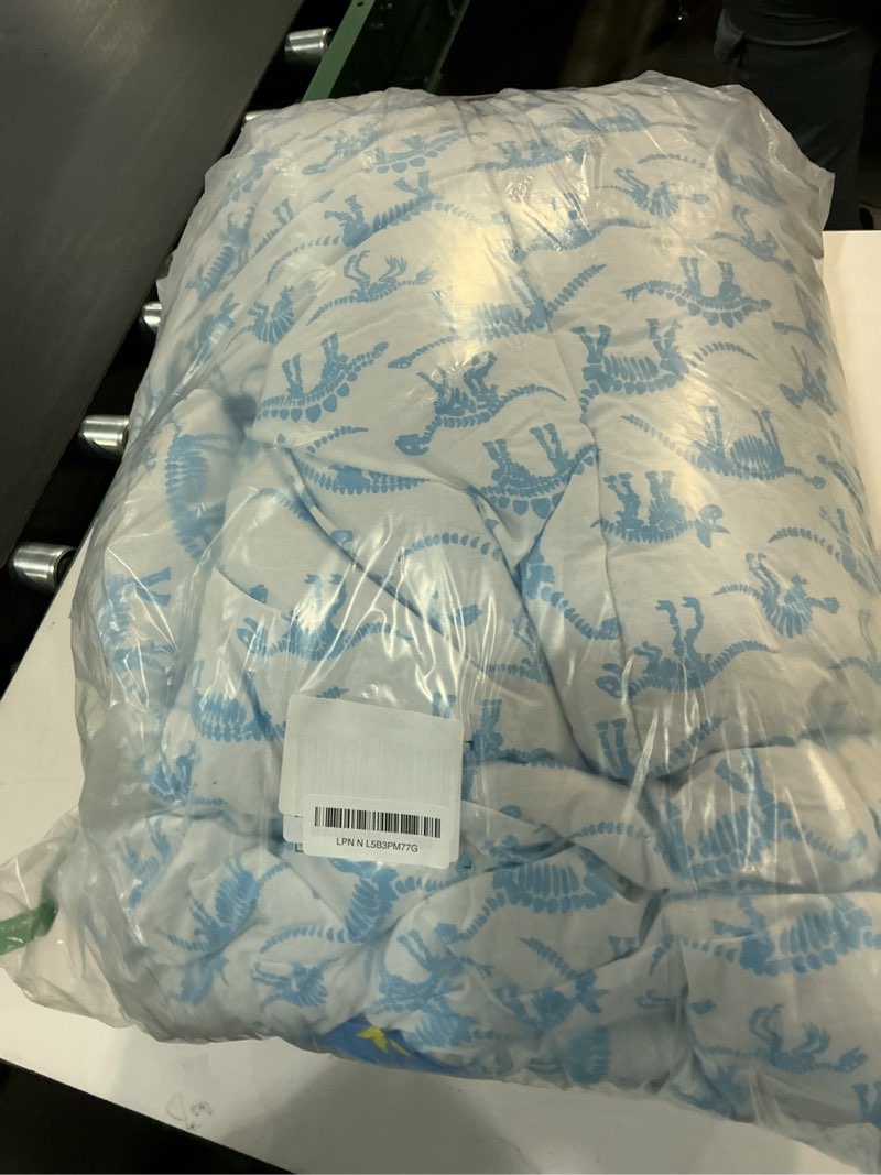 Condition photo showing As Is for Amazon Basics Kids' 3 Piece Lightweight Cotton Shell Reversible Comforter Set with Sham, USTCP Certified Cotton Shell, Twin, Dinosaurs Twin Dinosaurs