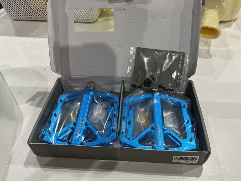 Condition photo showing Good Condition for fifty-fifty mountain bike pedals, non-slip and aluminum alloy bicycle flat pedals, 9/16" sealed bearing, lightweight and wide platform for all mountain, enduro, downhill, e-bike, mtb blue