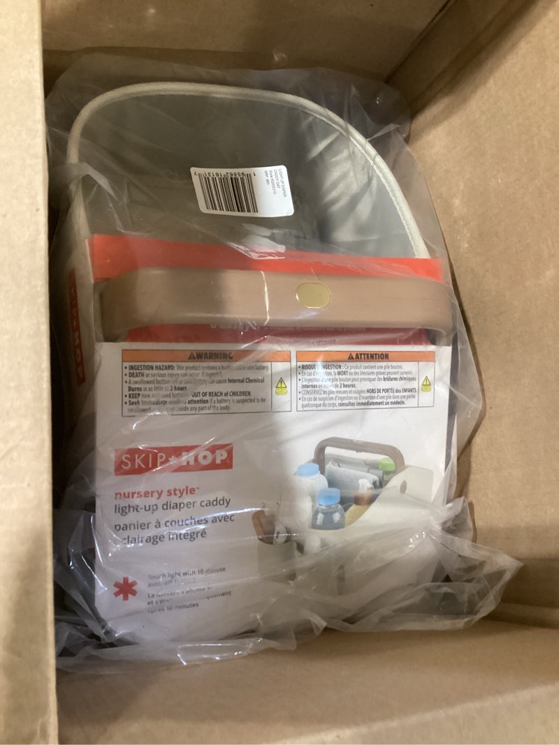 Condition photo showing Good Condition for skip hop diaper caddy organizer with touch sensor night light nursery style oat light-up diaper caddy oat