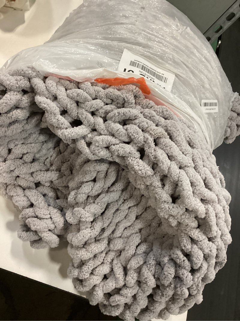 Condition photo showing Good Condition for bigacogo chunky knit throw blanket for couch, 40x80 inches, 100% hand knitted with thick jumbo chenille yarn, cozy soft large rope knot cable crochet blankets for sofa bed living room, light grey light grey w/ a little bit purple 40"x80" (special size throw)
